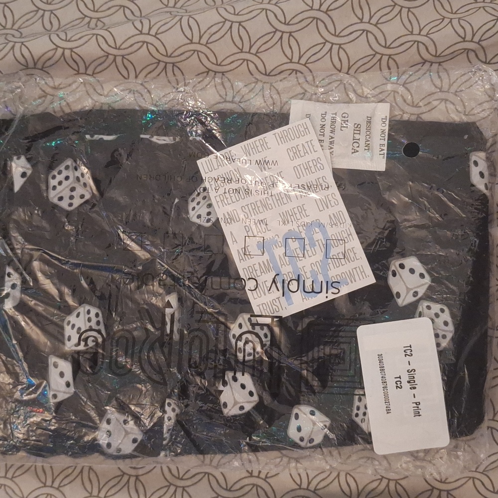 Tc 2 Lula roe dice leggings,never been worn!